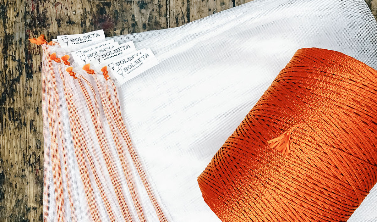 Bolsa reutilizable y retornable BOLSETA con cordón naranja